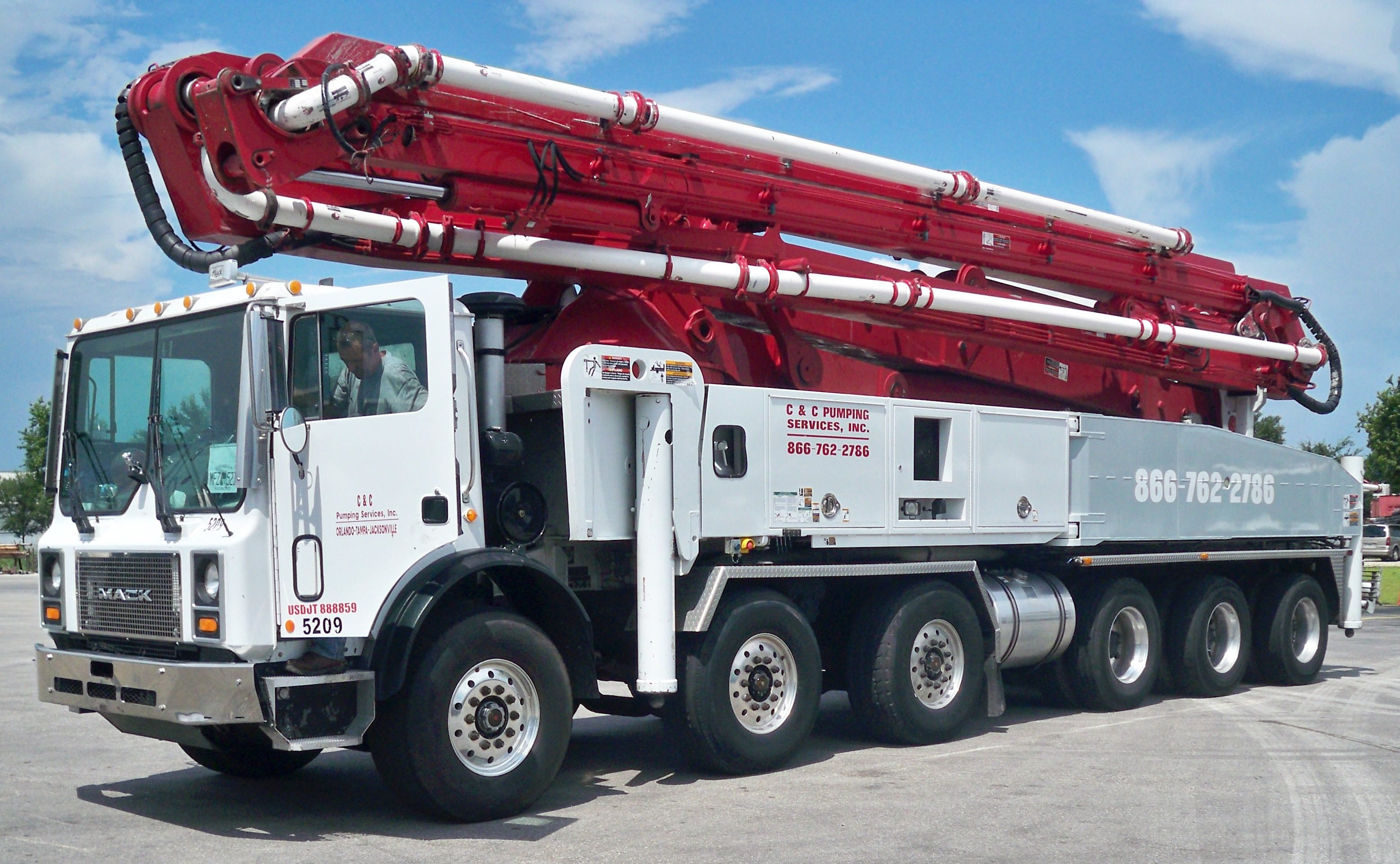 52 Meter concrete boom pump, provided by C&C Pumping Services Inc. 